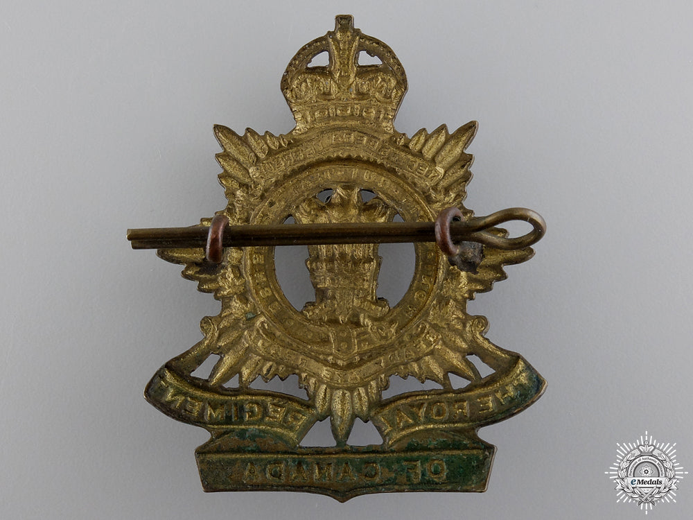 a_wwii_royal_regiment_of_canada_cap_badge_img_02.jpg54a8269e6a24f