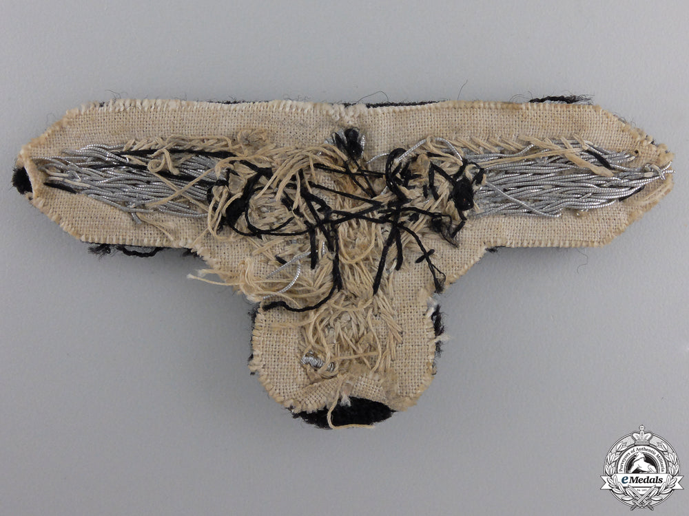 an_early_ss_officer’s_sleeve_eagle;_tunic_removed_img_02.jpg55255dcc6d7bf