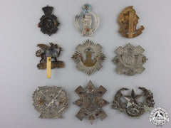 Nine First War British Cap Badges