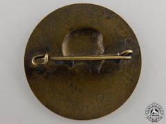 A 1934 A. H Bronze Badge