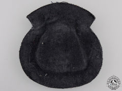 A Merchant Marine Officer's Cap Badge