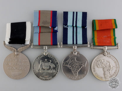 four_second_war_commonwealth_service_medals_img_02.jpg54ac19f0af64c