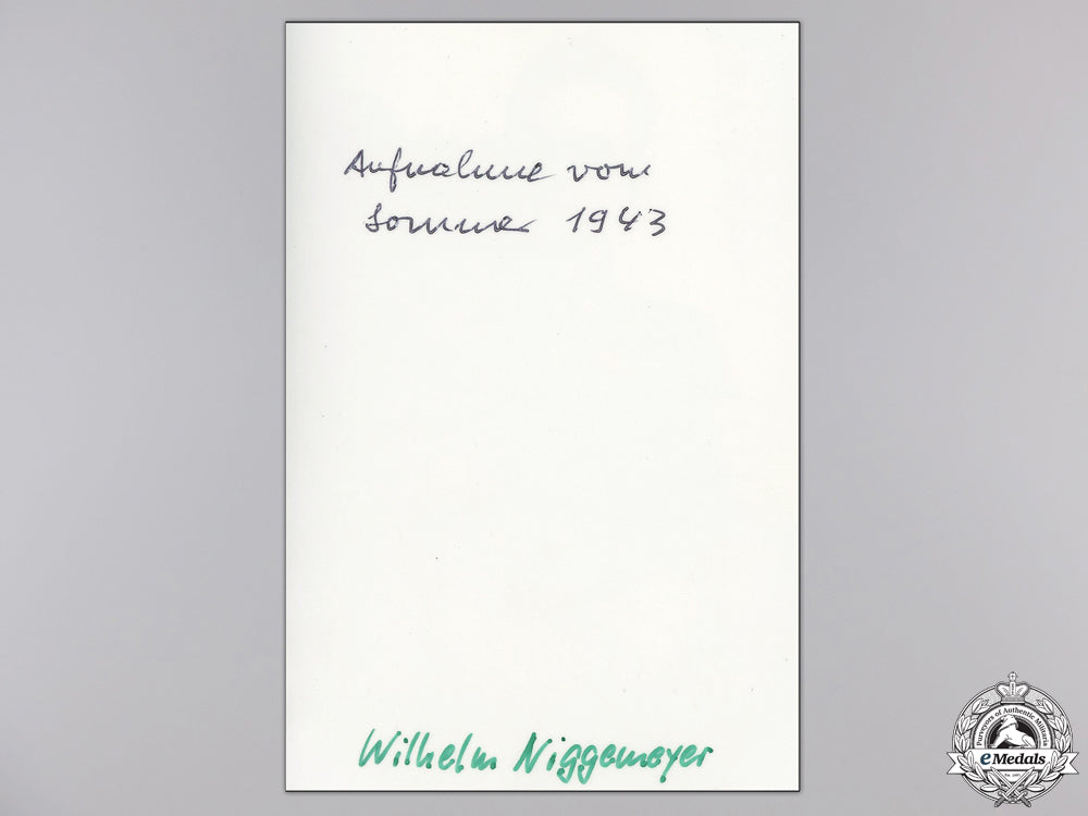 a_post_war_signed_photograph_of_knight's_cross_recipient;_niggemeyer_img_02.jpg551ac43681613