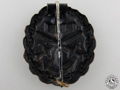 A German Imperial Naval Wound Badge; Black Grade