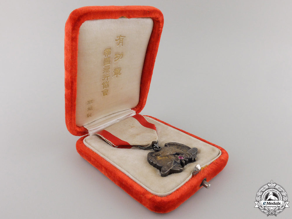 japan,_imperial._a_rare_flying_association_merit_medal,1929_img_03.jpg55774292cc7b7_1_1