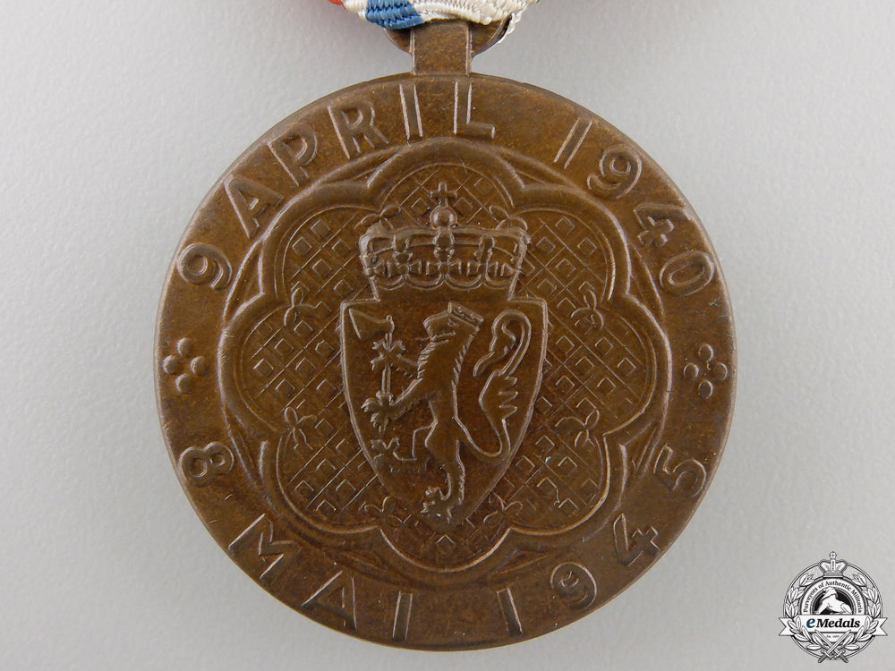 norway._a1940-45_war_medal_with_packet_img_03.jpg5575b0acaa974