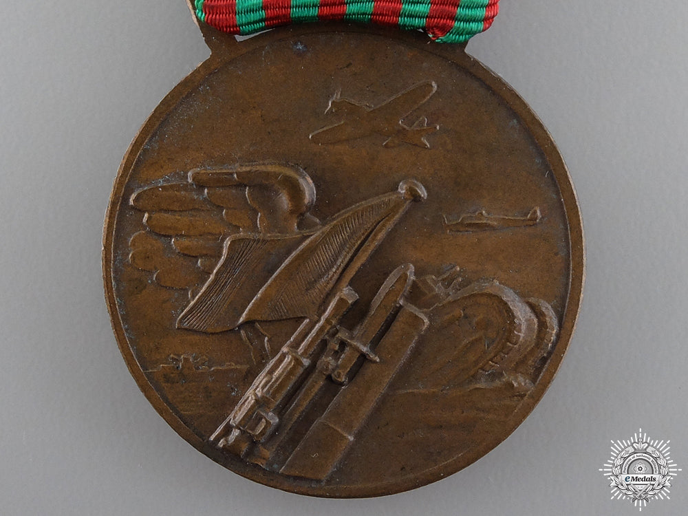 a1940-1943_italian_second_war_commemorative_medal_img_03.jpg54c2a58d4de09