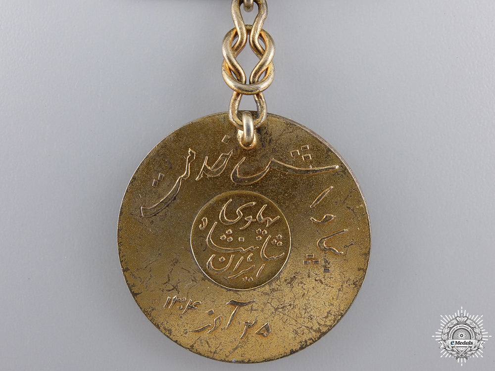 an_iranian_order_of_homayoun;_gold_grade_medal_img_03.jpg54e350d640d81