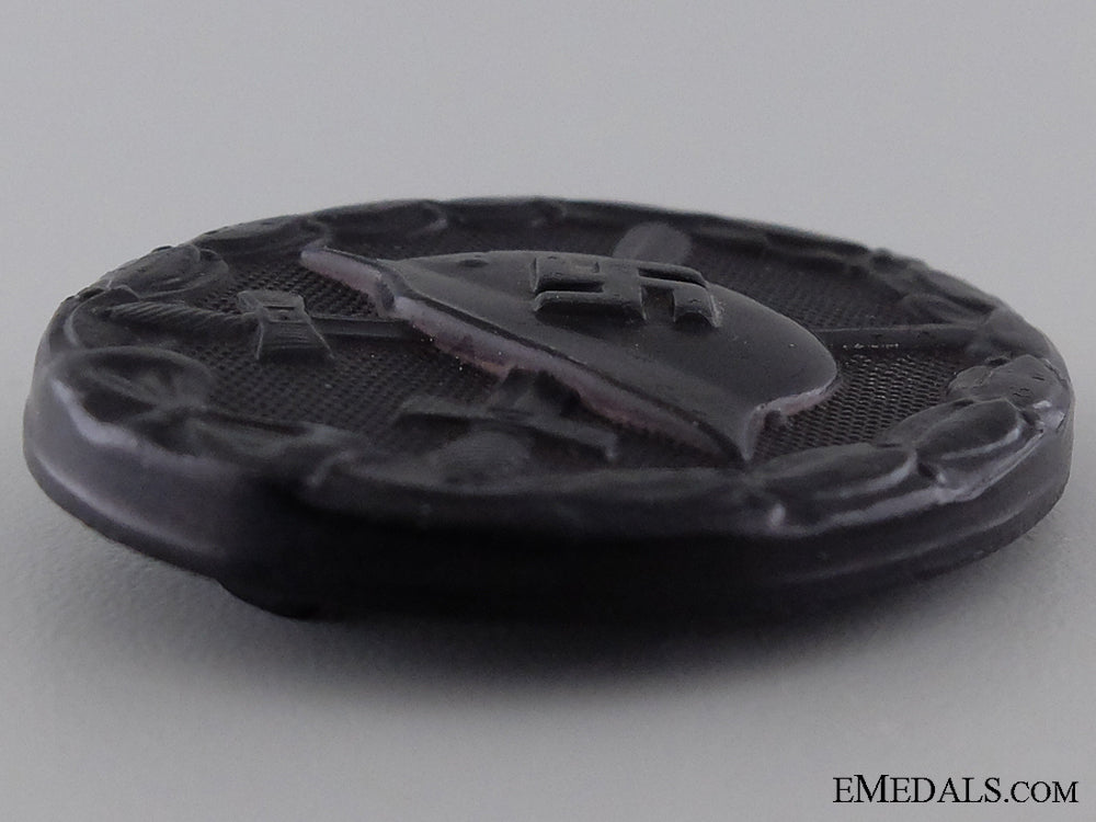a_black_grade_second_war_wound_badge;_marked_img_03.jpg53c7dd08806a7