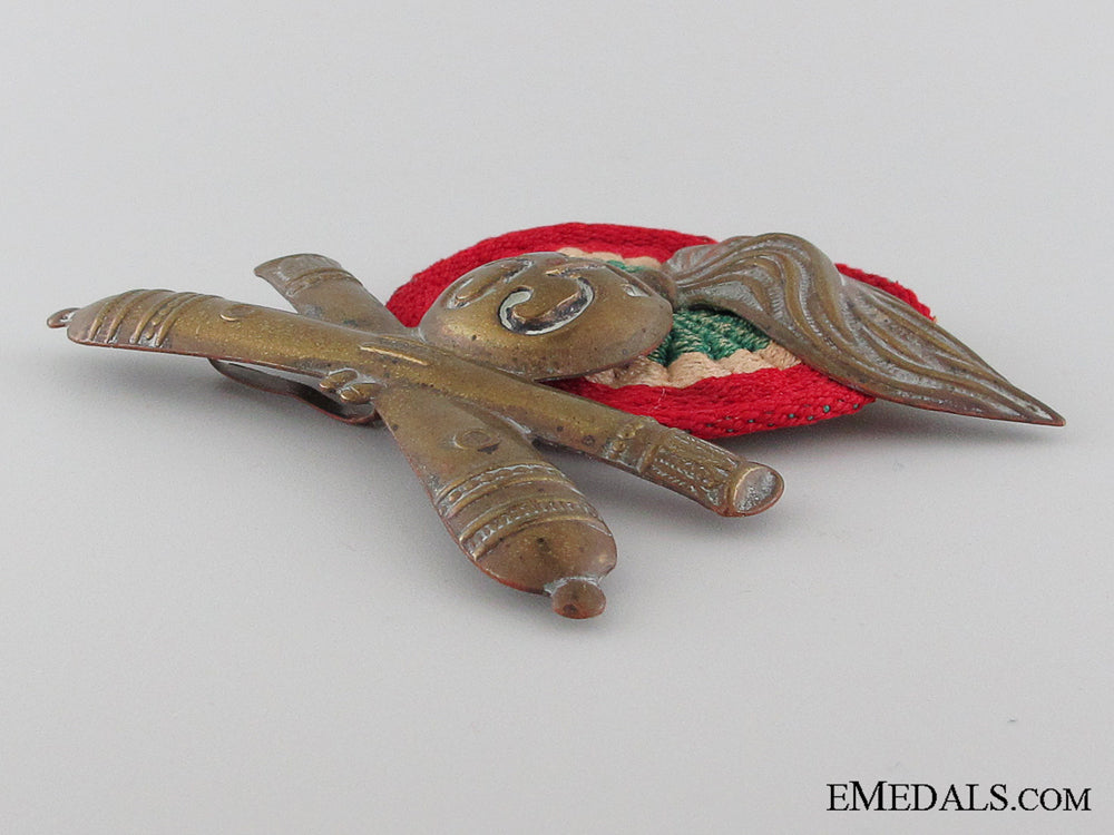 wwii55_th_artillery_division_pith_helmet_insignia_img_03.jpg52efc75497fb7