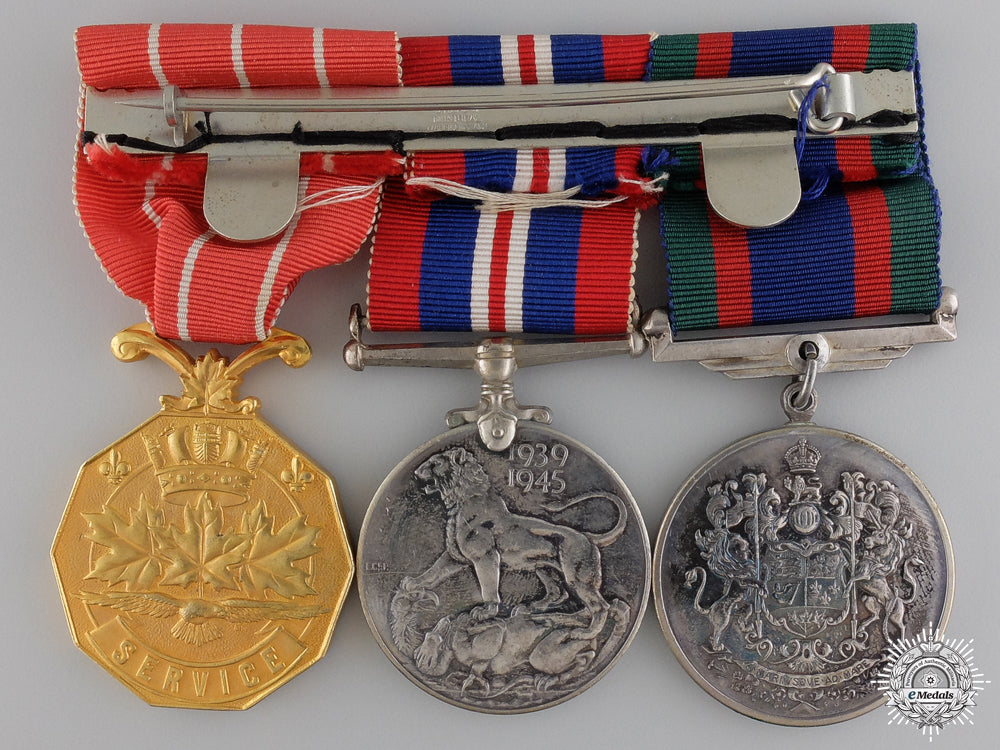 a_second_war_rcaf_medal_group_to_squadron_leader_macdonald_img_03.jpg54b80a6073d5c