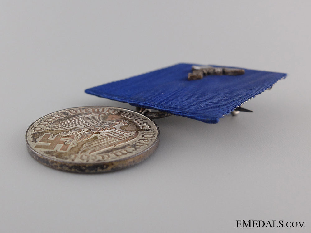 wehrmacht_long_service_medal;_luftwaffe_eagle_img_03.jpg5409dce40229f
