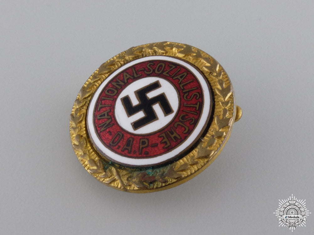 a_golden_party_badge_issued_to_max_held1934_img_03.jpg5479f8acbd57c
