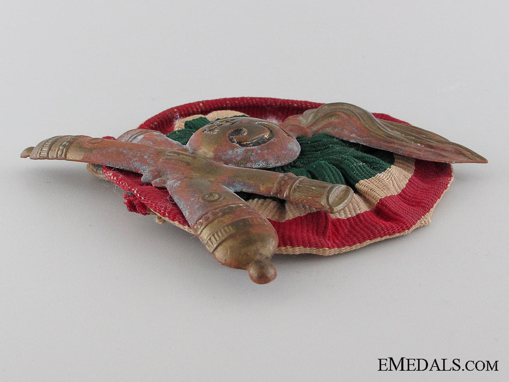 wwii45_th_artillery_division_pith_helmet_insignia_img_03.jpg52efc6246bbe4