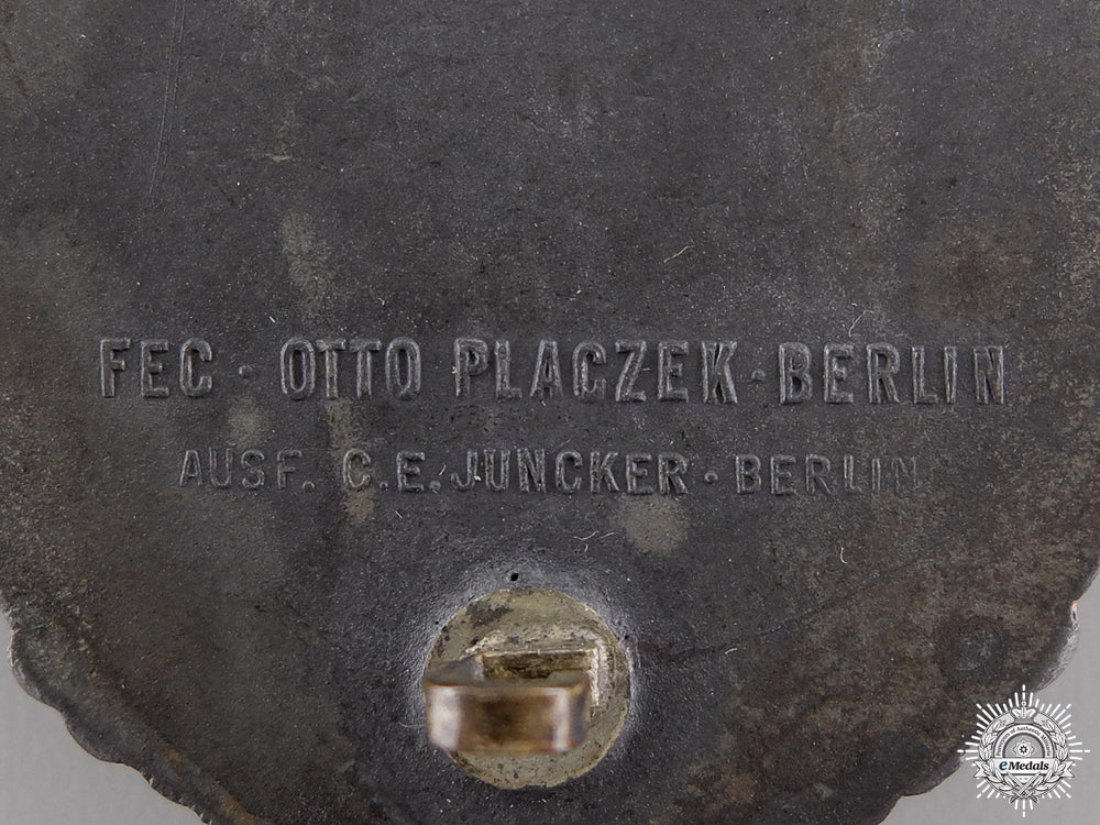 a_kriegsmarine_coastal_artillery_badge_with_recipient_photographs_img_04.jpg54c279eb0904a