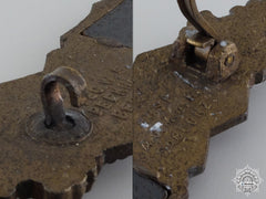 A Bronze Grade Close Combat Clasp
