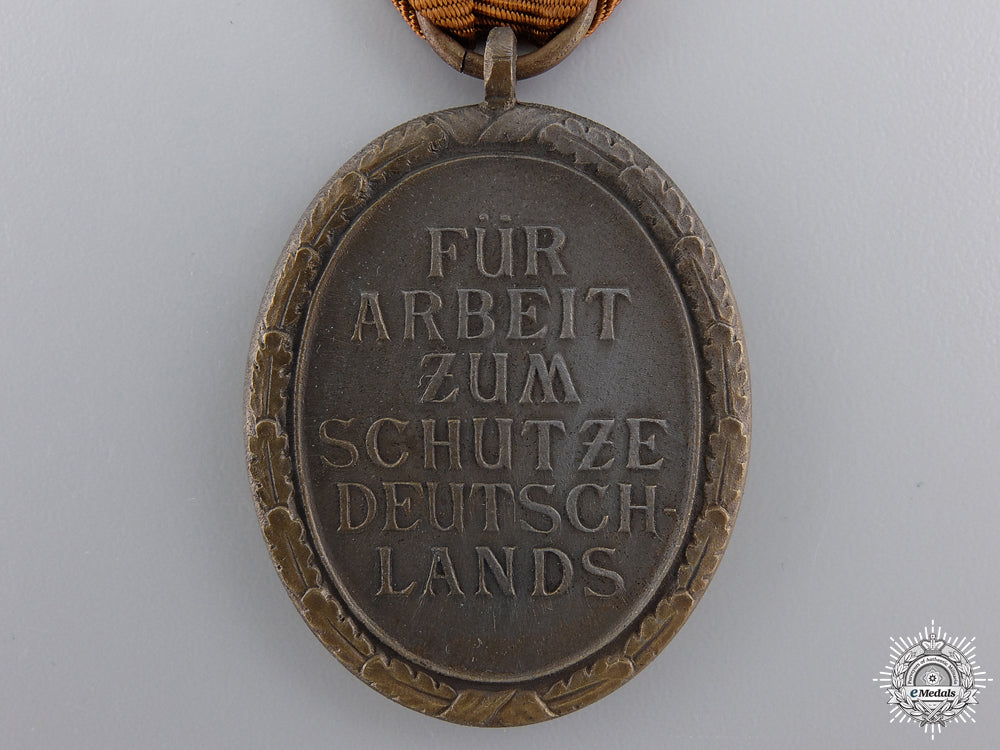 a_second_war_west_wall_medal_with_packet_img_04.jpg54eca7111d706