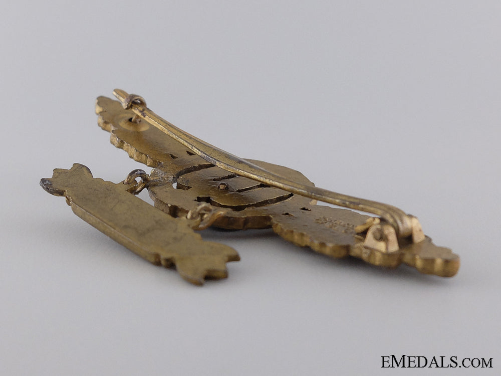 a_gold_bomber_pilot’s_clasp_with1200_hanger_by_m._kunststoff,_gablonz_img_04.jpg53f8a3b4e0a36