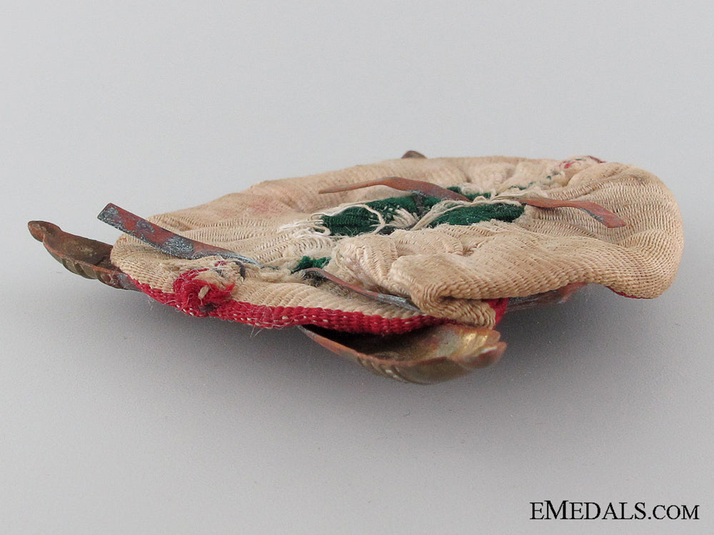 wwii45_th_artillery_division_pith_helmet_insignia_img_04.jpg52efc6c1ec7e8