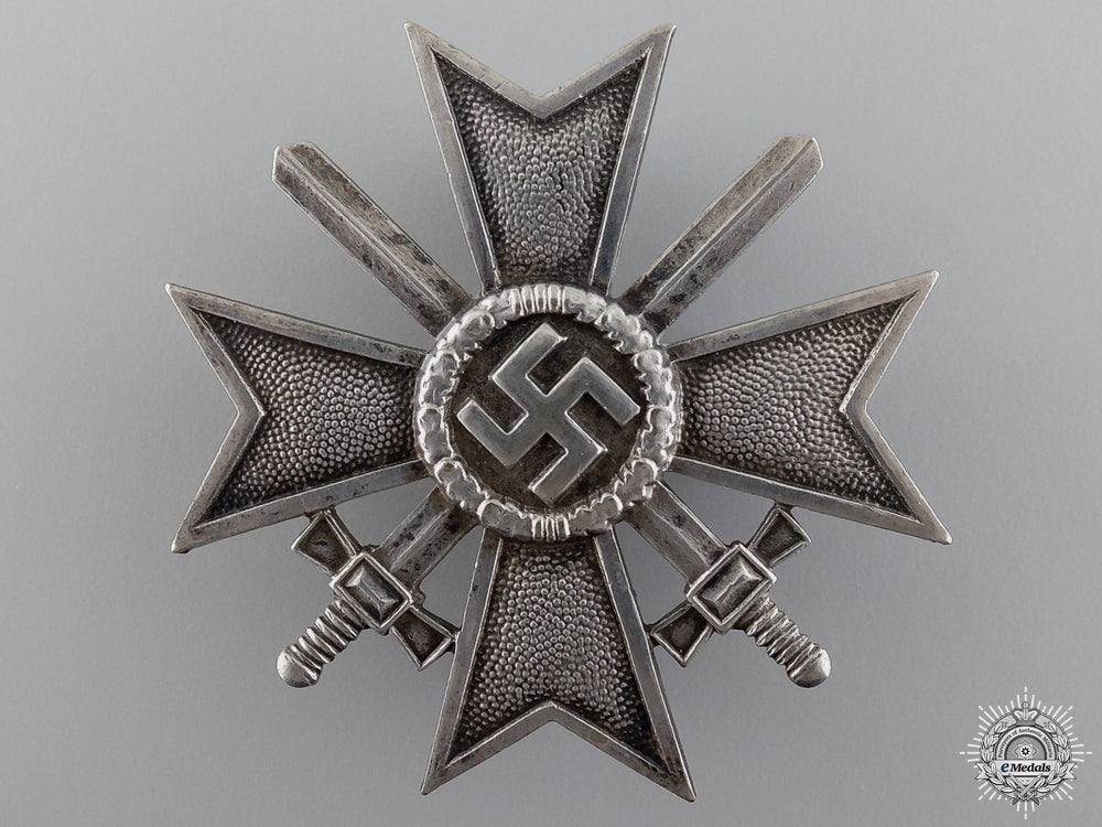 an_early_cased_first_class_war_merit_cross_with_swords_img_04.jpg54bd1ffba5475