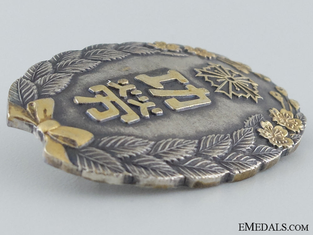 greater_japan_civil_defence_and_police_association_special_award_badge_img_06.jpg53650d9ddde82