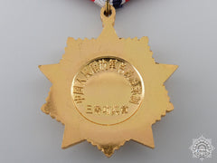 A Chinese Meritorious Service Medal; Third Class