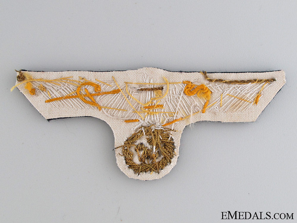 kriegsmarine_officer’s_tunic_eagle_in_bullion_img_5431_copy.jpg52869cacdbc41