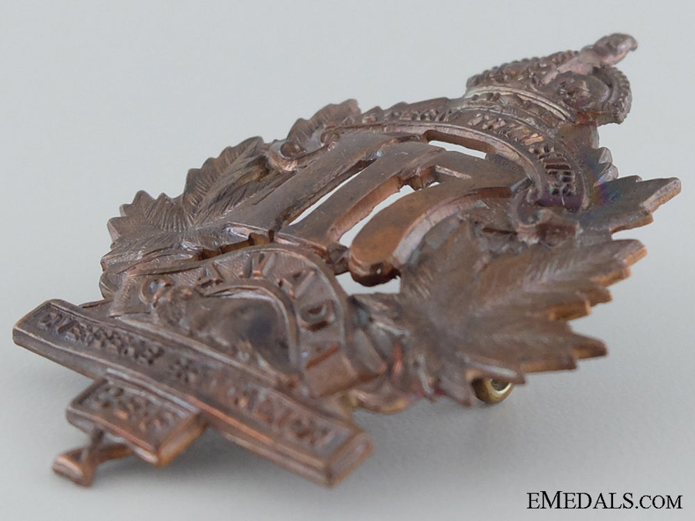 wwi117_th_battalion"_eastern_township_battalion"_cap_badge_img_57.jpg537257408b401