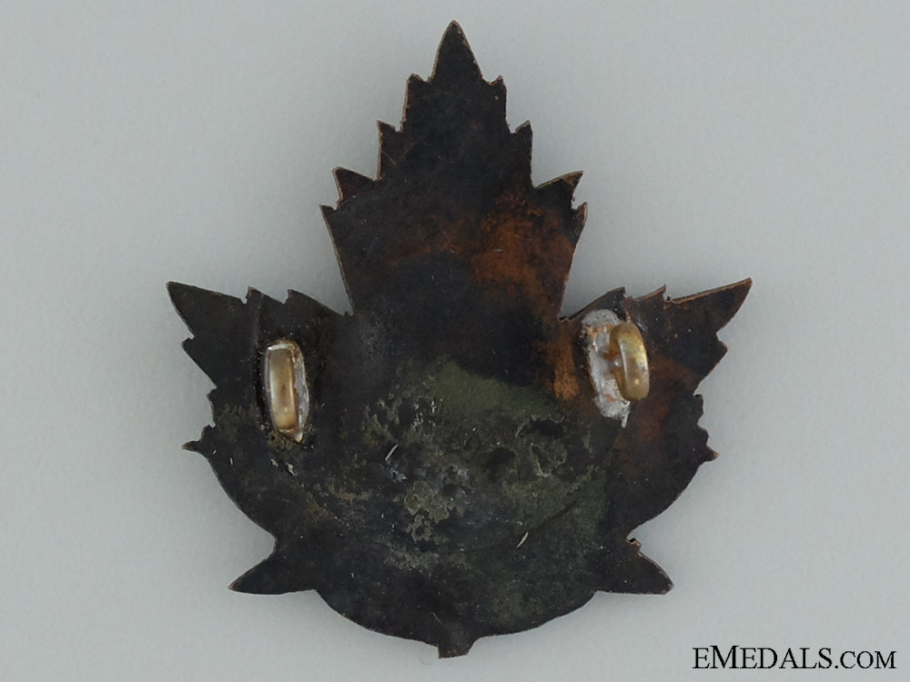 wwi24_th_infantry_battalion"_victoria_rifles"_cap_badge_img_69.jpg53752e25e8bc5