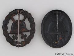 Two Black Grade Wound Badges