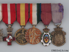 An Eight Piece Spanish Miniature Group