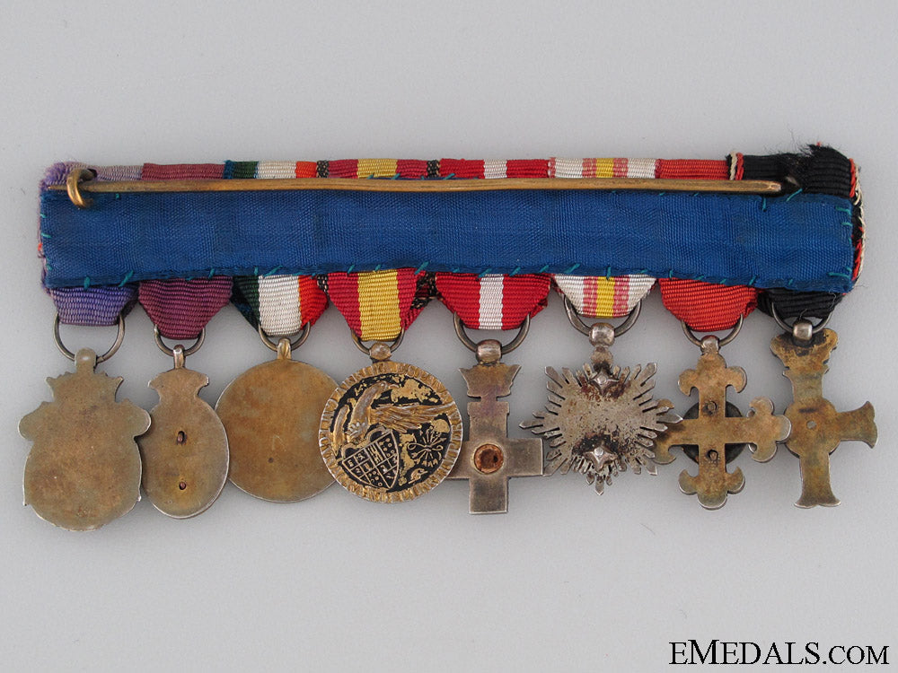 an_eight_piece_spanish_miniature_group_img_9231_copy.jpg52a7657495a2d