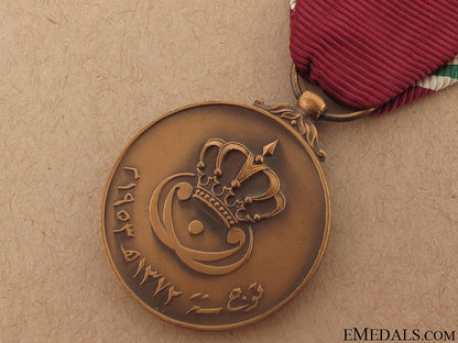 king_faisal_ii_coronation_medal,1953_io552c