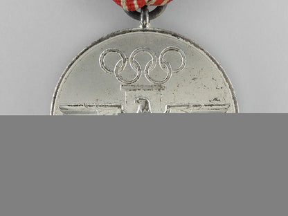 a_xi_summer_olympic_games_medal_with_case_k_016