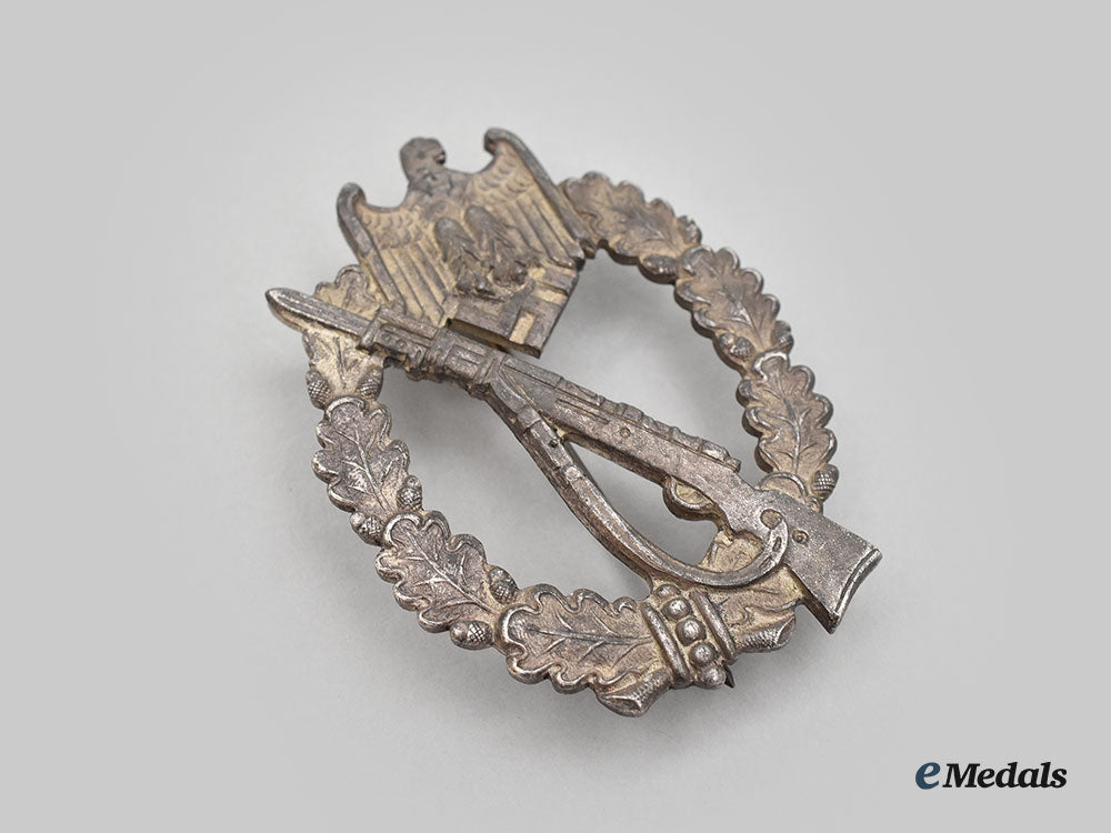 germany,_wehrmacht._an_infantry_assault_badge,_silver_grade,_by_carl_wild_l22_mnc0058_267