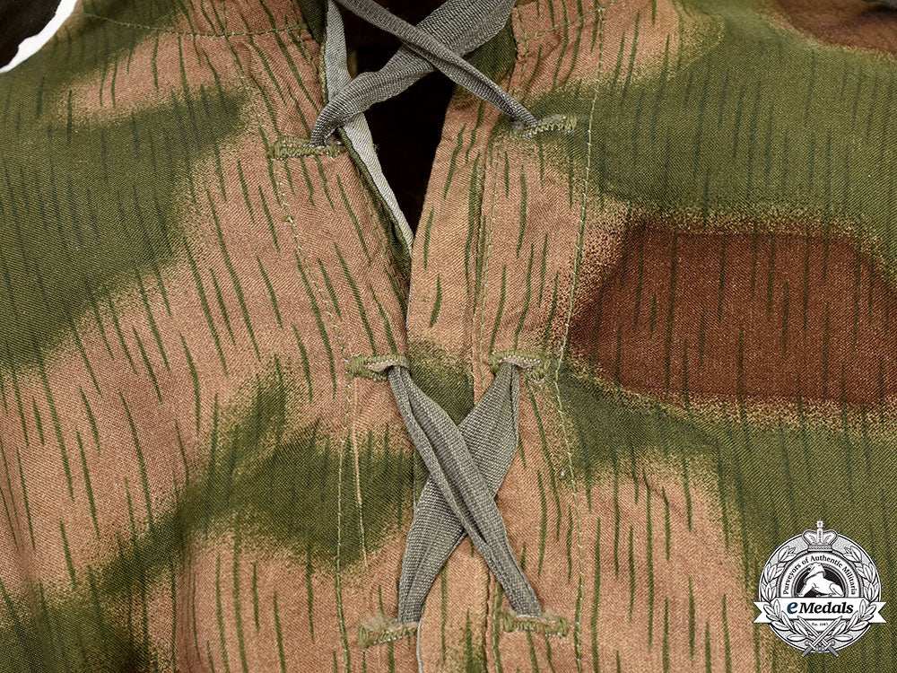 germany,_heer._a_rare_camouflage_smock_and_award_documents_to_sniper_obergefreiter_august_pamann,33_confirmed_kills_l22_mnc0317_189_1