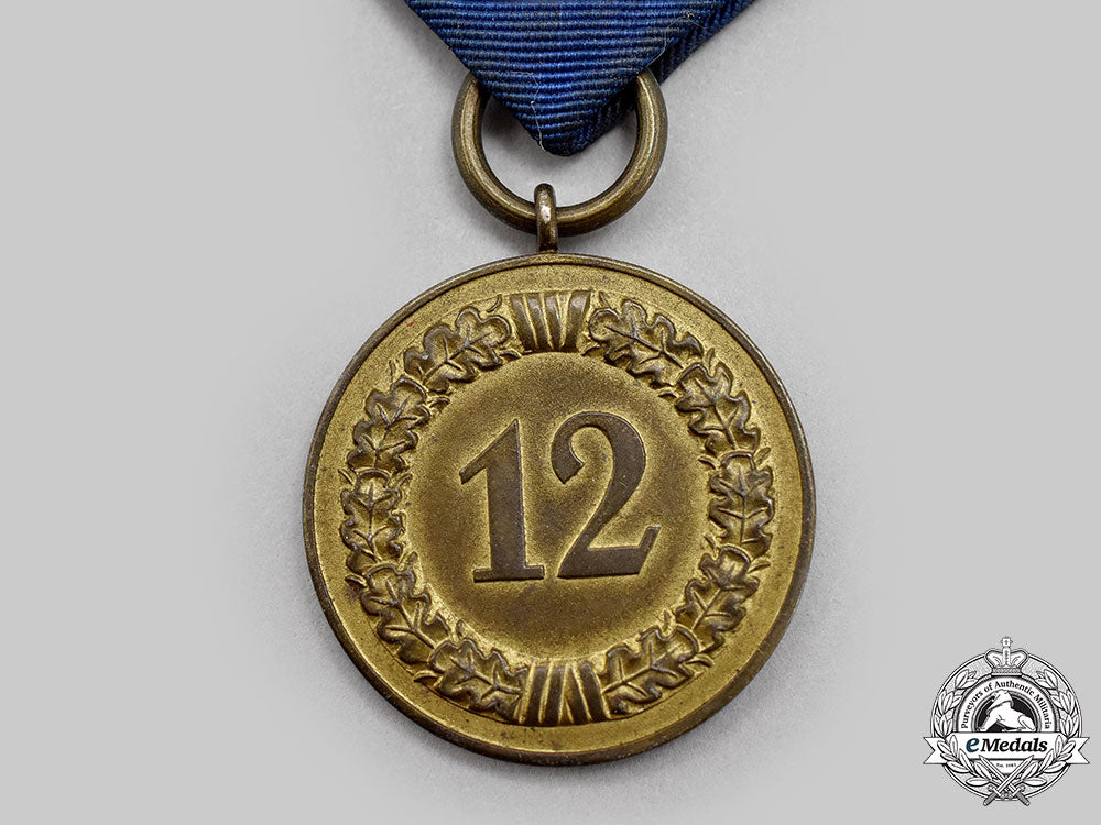 germany,_wehrmacht._a_long_service_decoration,_iii_class_for12_years,_luftwaffe_issue_l22_mnc0390_230