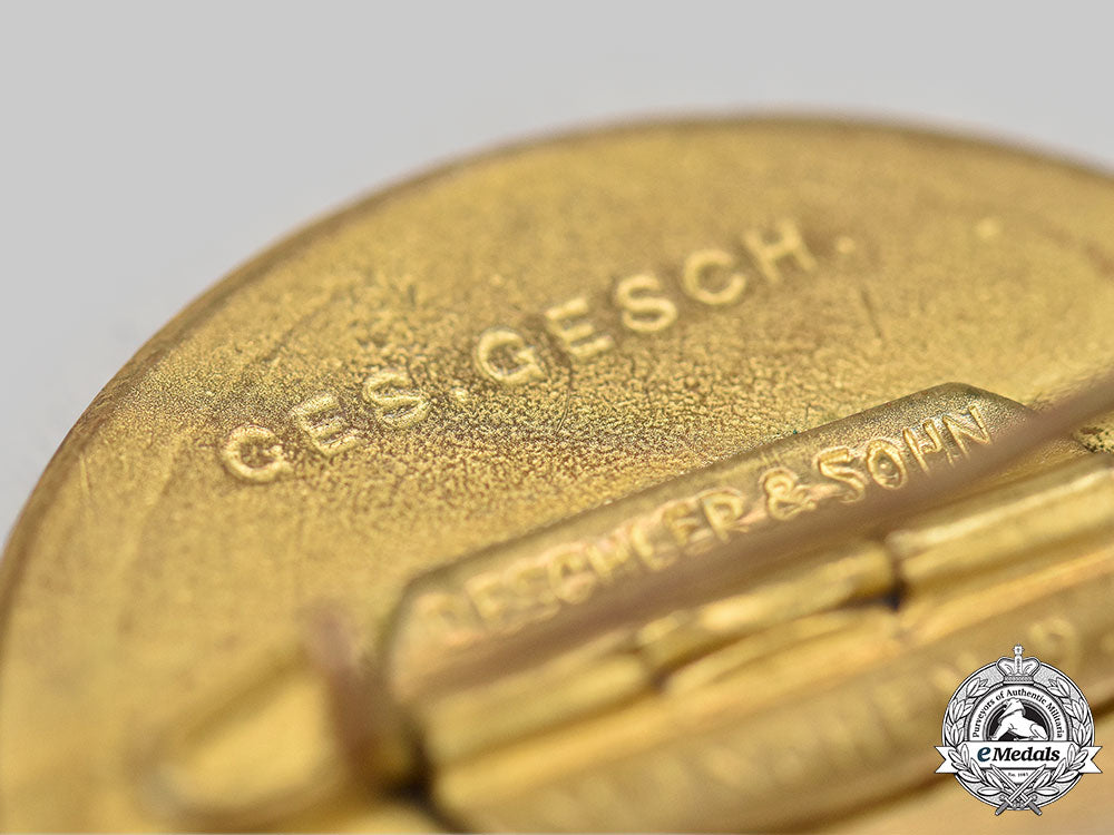 germany,_nsdap._a_golden_party_badge,_large_version,_by_deschler&_sohn_l22_mnc1303_592