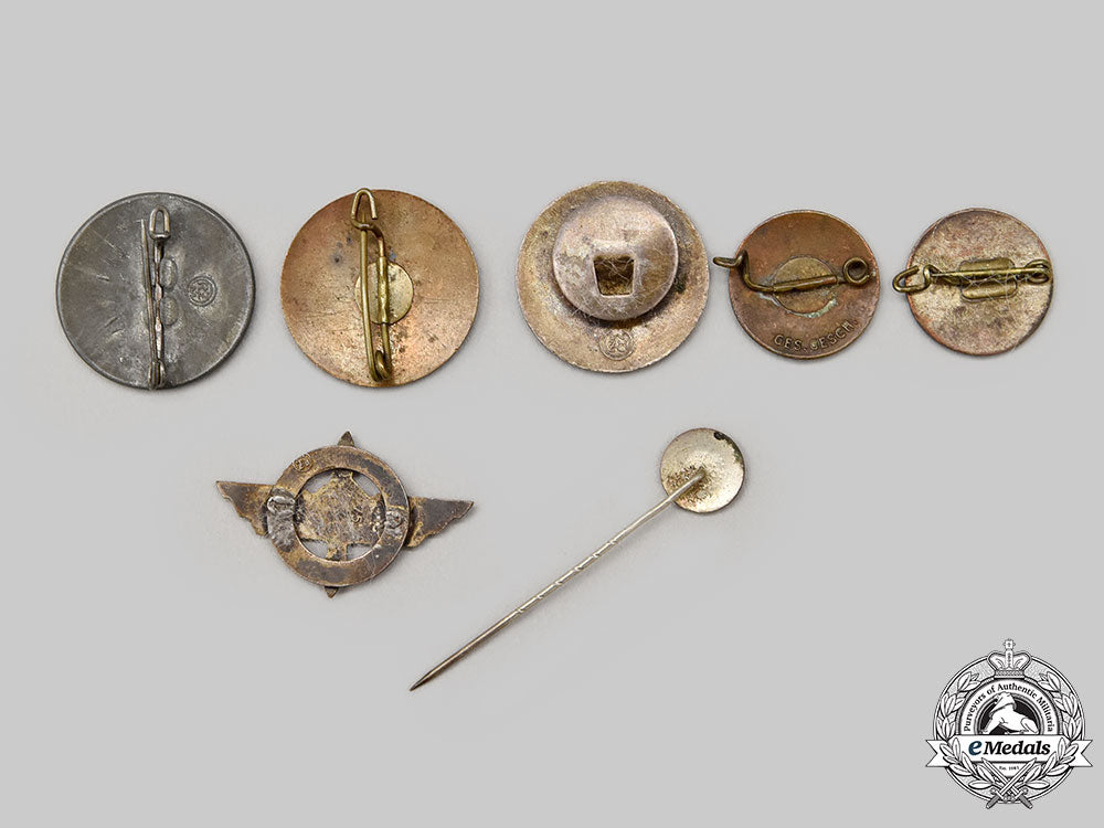 germany,_nsdap._a_mixed_lot_of_party_membership_badges_l22_mnc1483_638