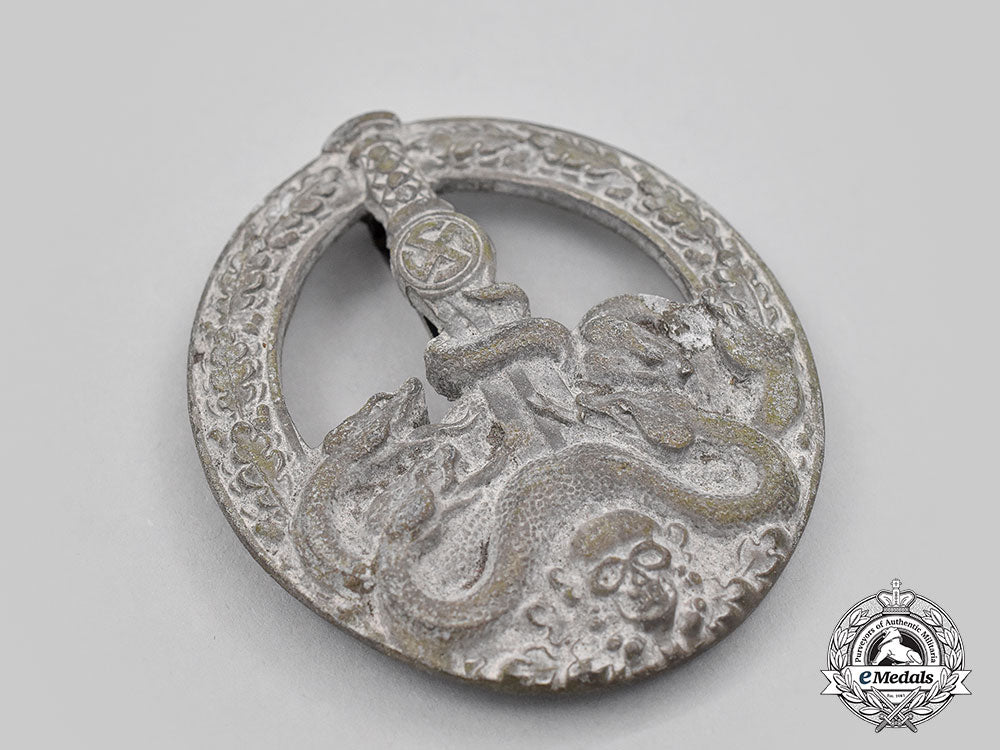 germany,_wehrmacht._an_anti-_partisan_badge,_silver_grade_l22_mnc1811_233_1_1