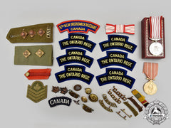 Canada. Lot Of Thirty-Four Military-Themed Items