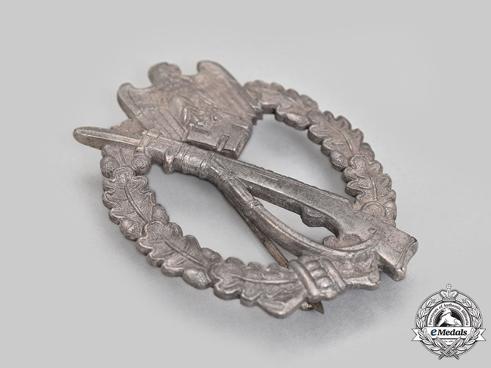 germany,_wehrmacht._a_late-_war_infantry_assault_badge,_silver_grade,_by_fritz_zimmermann_l22_mnc3105_470_1_1