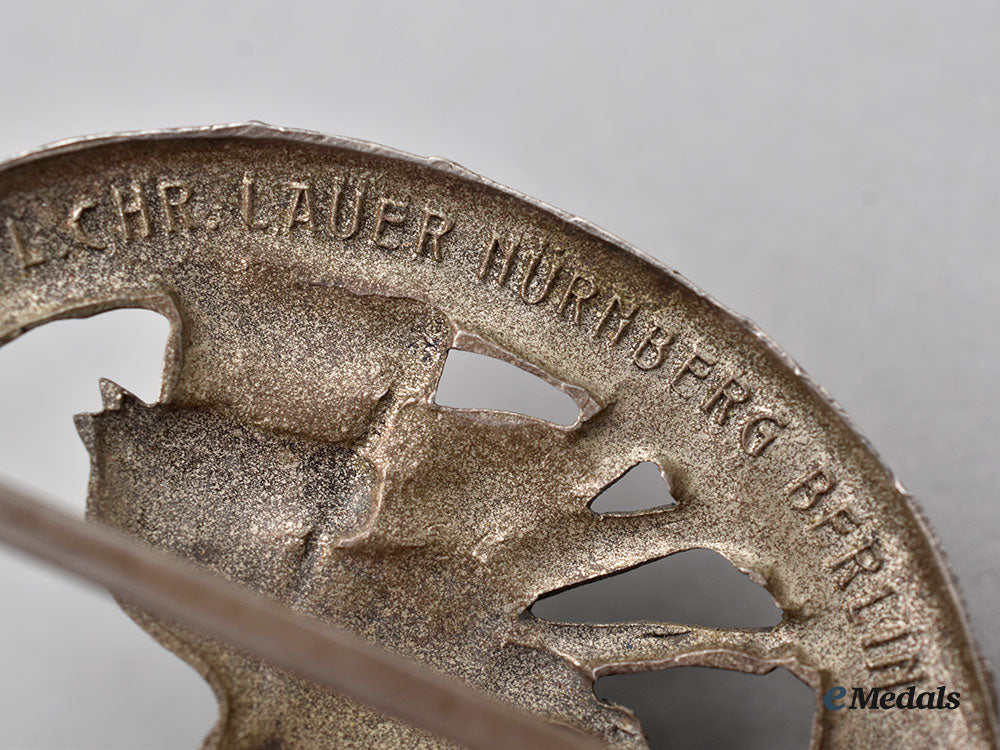 germany,_third_reich._a_german_horse_driver’s_badge,_ii_class_in_silver,_by_l._christian_lauer_l22_mnc5710_918