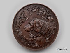 Austria, Empire. A Bronze Hunting Dog Table Medal 1896