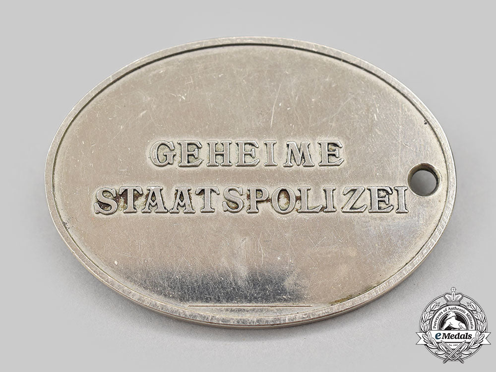 germany,_third_reich._a_rare_and_unissued_gestapo_warrant_disc_l22_mnc7310_538_1