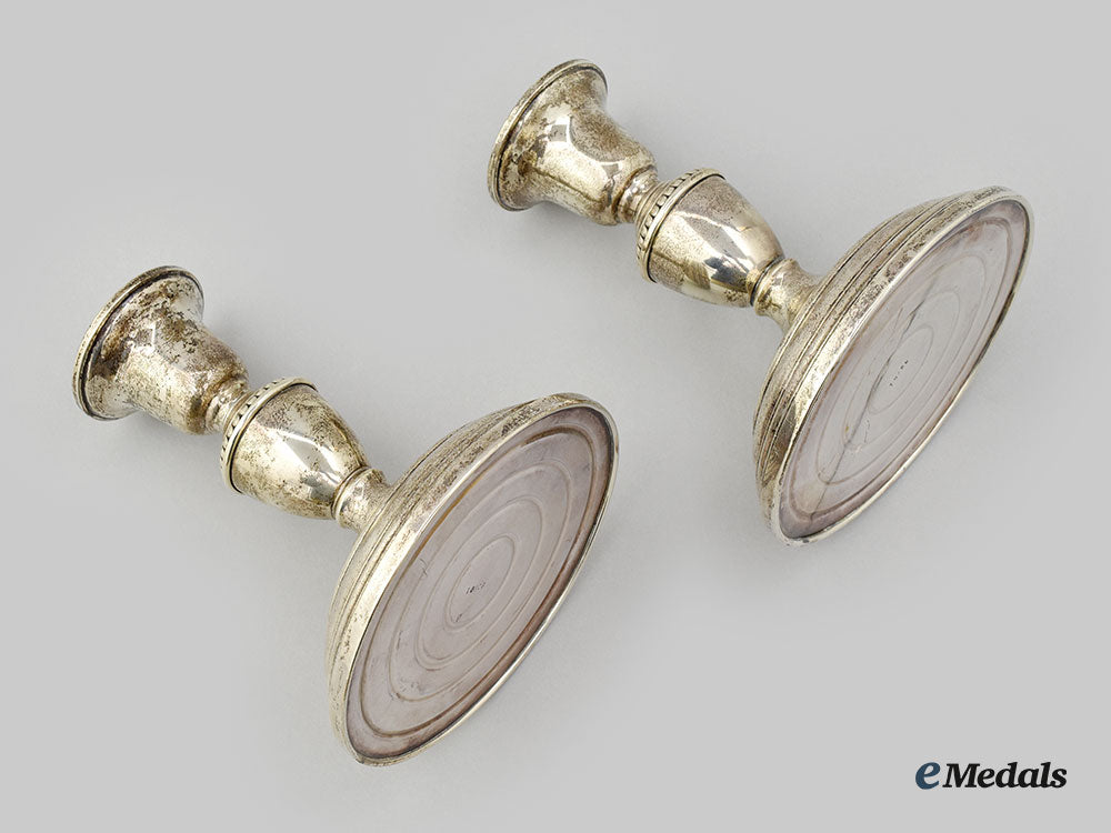 canada,_commonwealth._a_set_of_two_large_silver_candlestick_holders,_by_birks_l22_mnc8592_069_1