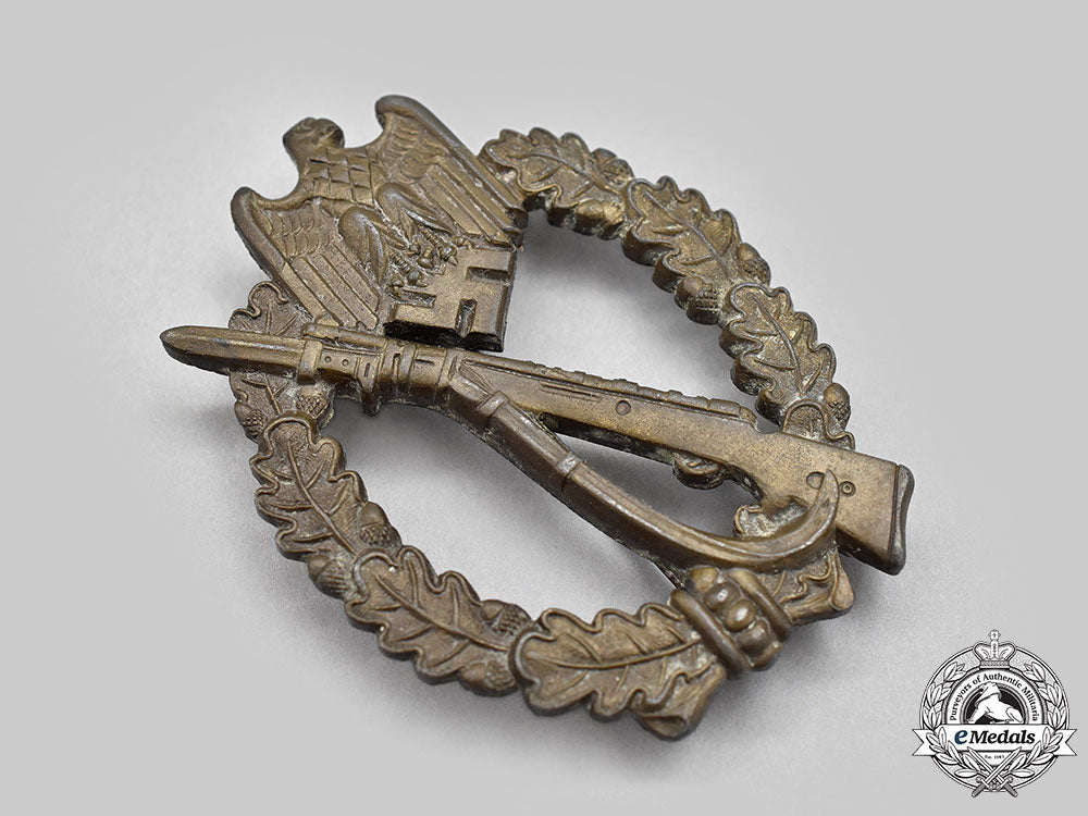 germany,_wehrmacht._an_infantry_assault_badge,_bronze_grade,_by_m.k._l22_mnc8661_120_1