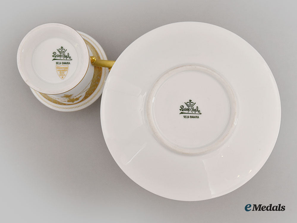 germany,_imperial._a_decorative_iron_cross_teacup_and_saucer_with_floral_motifs,_by_rosenthal_l22_mnc9367_621_1