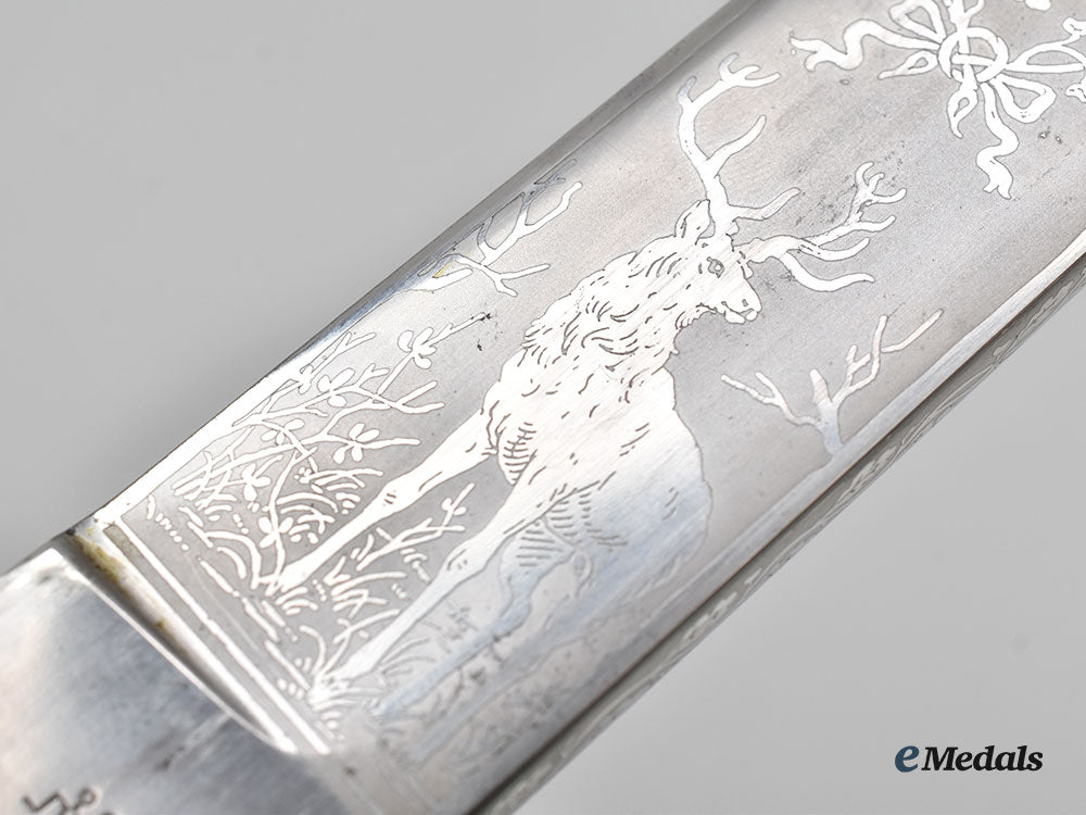 germany,_third_reich._a_german_hunting_association_cutlass,_by_j.a._henckels_l22_mnc9850_429_1