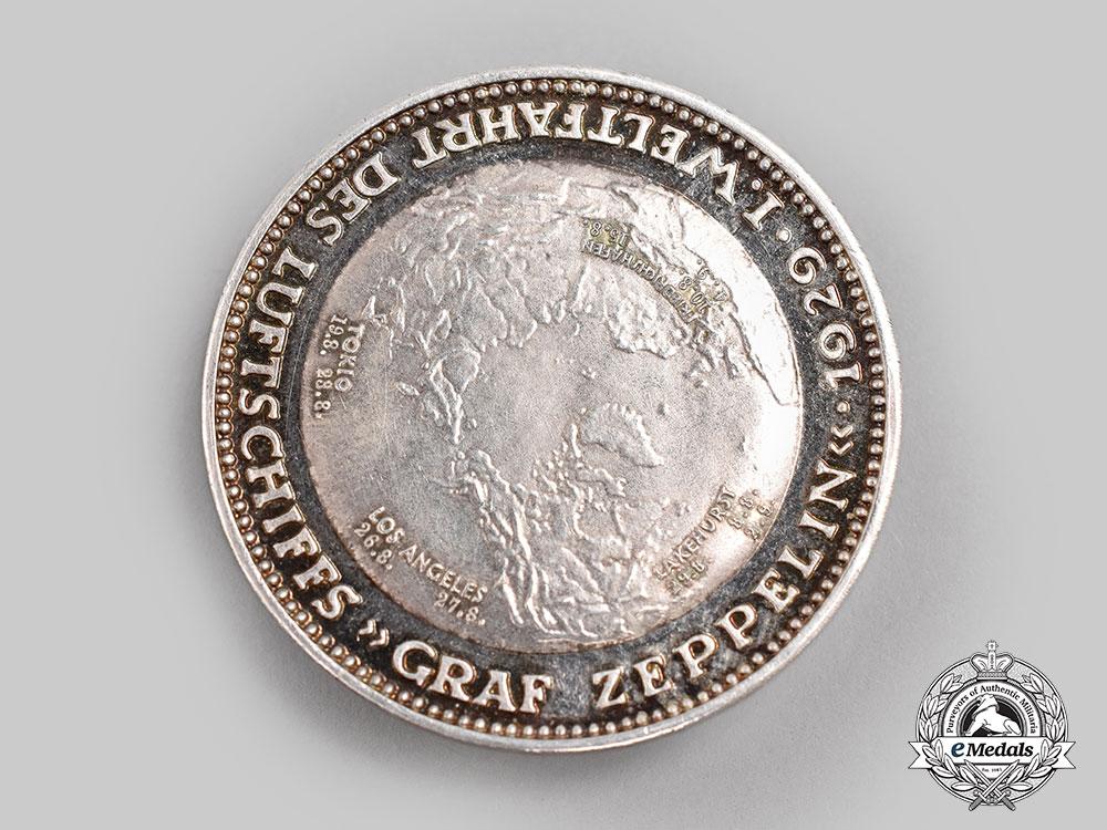 germany,_weimar_republic._a1929_airship_graf_zeppelin_round-the-_world_flight_commemorative_silver_medal,_by_the_prussian_mint_l22_mnc9976_269